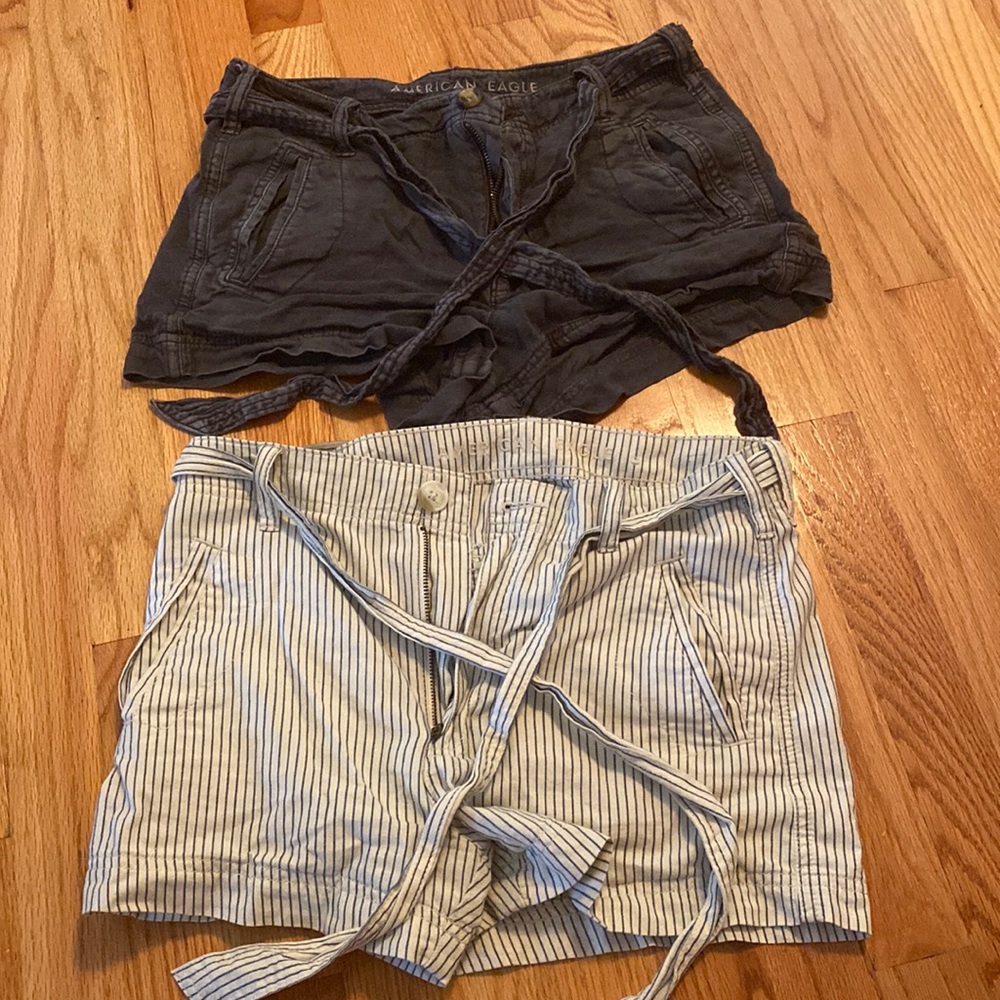 Two pairs of american eagle shorts with belt that is removable. Both size 4.